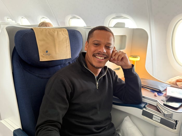 Travis enjoying his Global business class experience Travis enjoying his Global business class experience