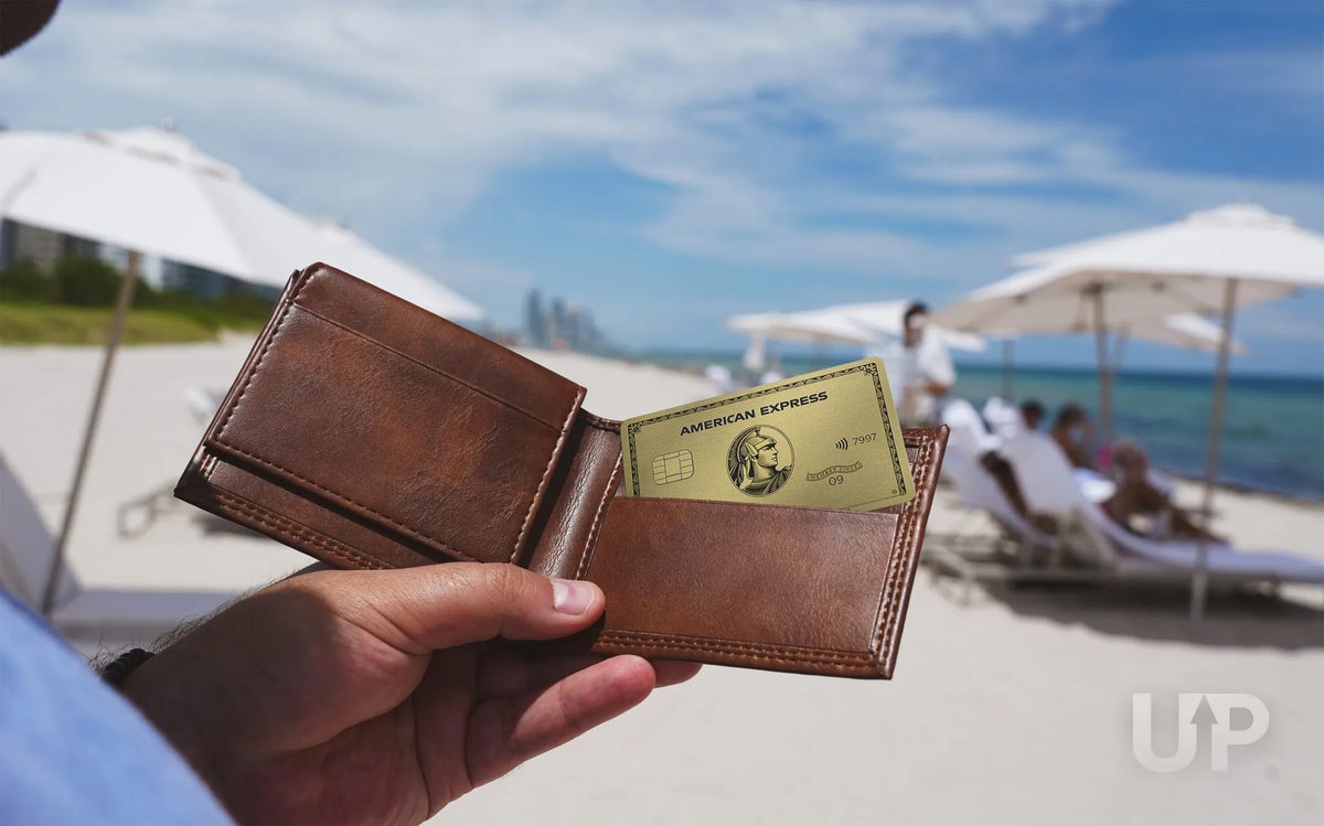 Amex Gold Card Brown Wallet on Beach Upgraded Points LLC