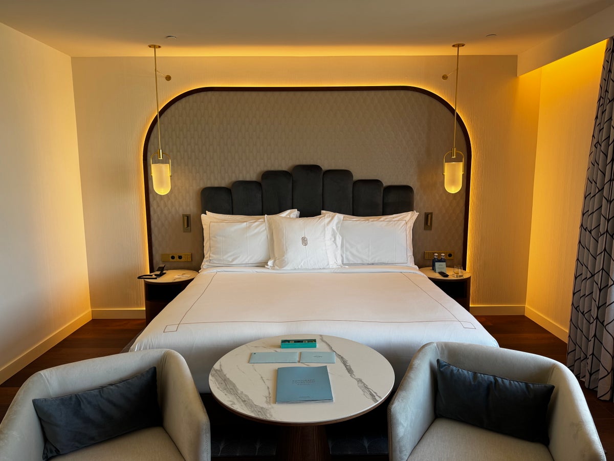 Grand Hotel Centenari Valencia Marriott Autograph Collection bedroom bed chairs