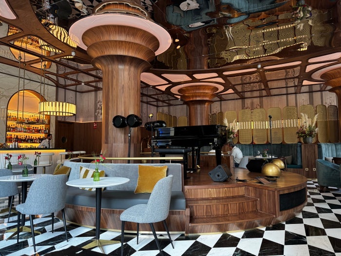 The Langley, a Luxury Collection Hotel, Buckinghamshire Grand Hotel Centenari Valencia Marriott Autograph Collection restaurant piano closeup