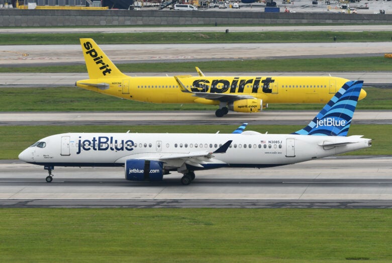 JetBlue A220 300 Spirit A321 taxiing ATL JetBlue A220 300 Spirit A321 taxiing ATL