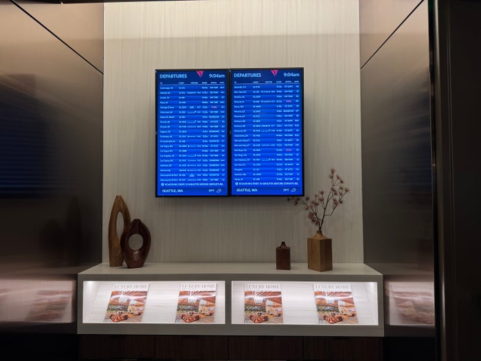 New Delta Sky Club SEA Departures Board New Delta Sky Club SEA Departures Board