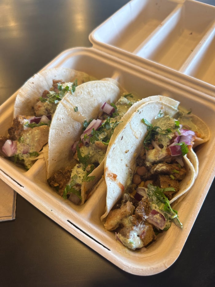 Tacos in a to go container Tacos in a to go container