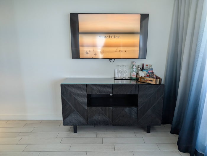 W Fort Lauderdale Supreme Suite living room dresser and TV W Fort Lauderdale Supreme Suite living room dresser and TV