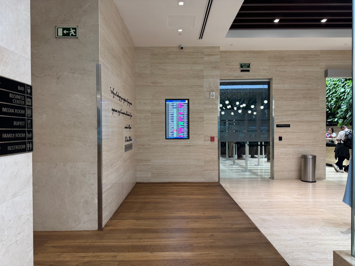 Copa Club PTY Terminal 2 departure board near entrance