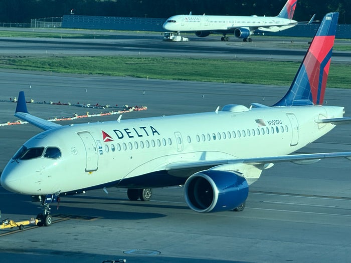 Delta Airlines A220 and Boeing 757 at Minneapolis MSP Delta Airlines A220 and Boeing 757 at Minneapolis MSP