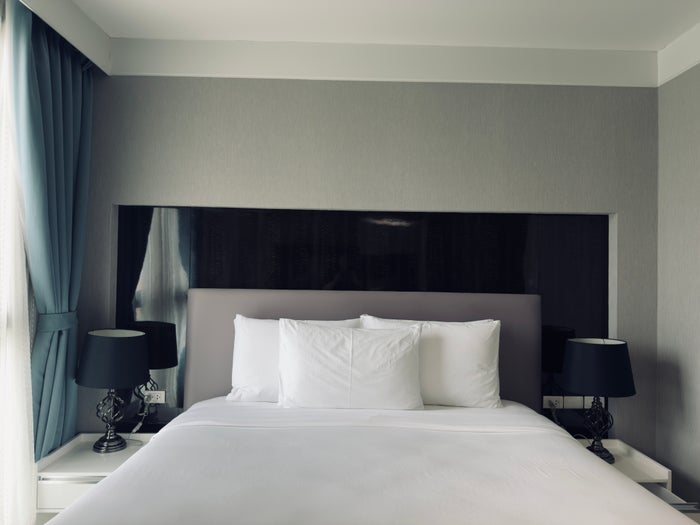 Metropolis Suites Bangkok room bed top view Metropolis Suites Bangkok room bed top view