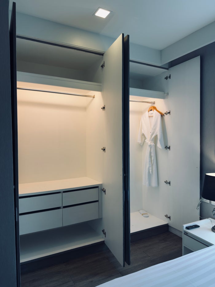 Metropolis Suites Bangkok room first closet space Metropolis Suites Bangkok room first closet space