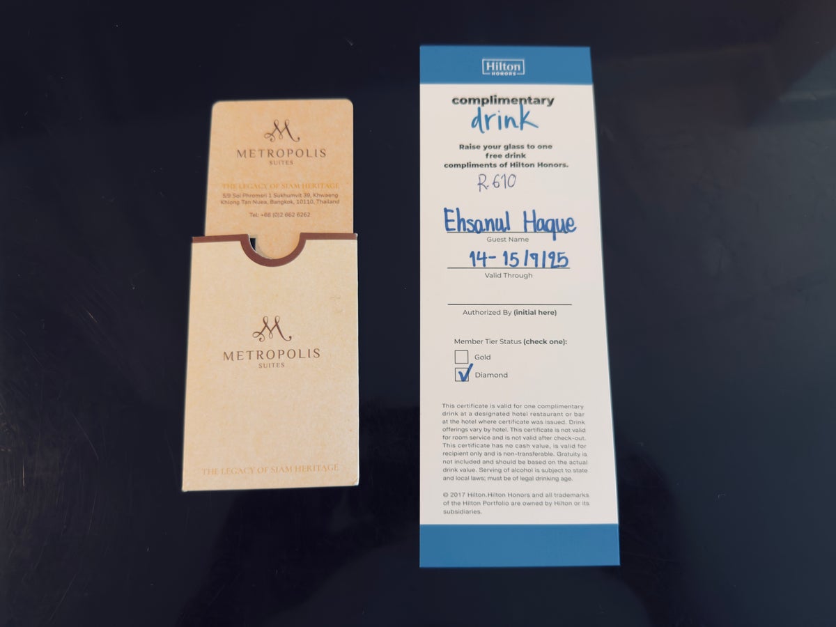Metropolis Suites Bangkok room key cards drink voucher