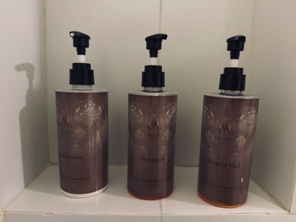 Metropolis Suites Bangkok room shower toiletries
