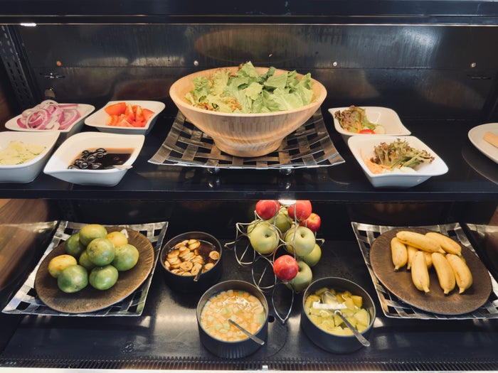 Metropolis Suites Bangkok salad and fruits Metropolis Suites Bangkok salad and fruits