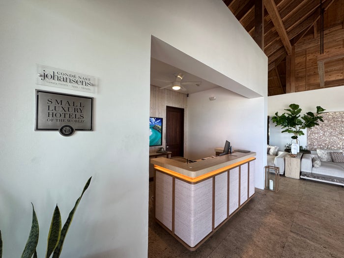 Sailrock South Caico Front Desk and SLH Sign JPG Sailrock South Caico Front Desk and SLH Sign JPG