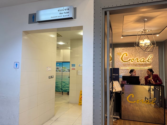 Coral Executive Lounge HKT restrooms by entrance Coral Executive Lounge HKT restrooms by entrance