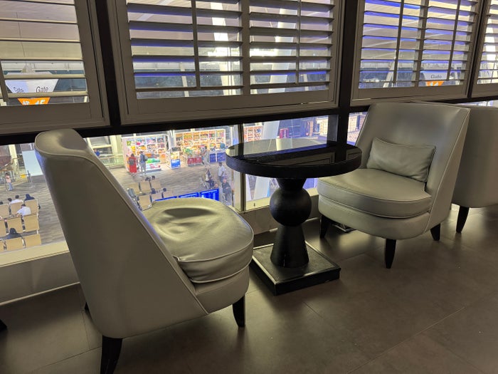 Coral Executive Lounge HKT seating at window Coral Executive Lounge HKT seating at window