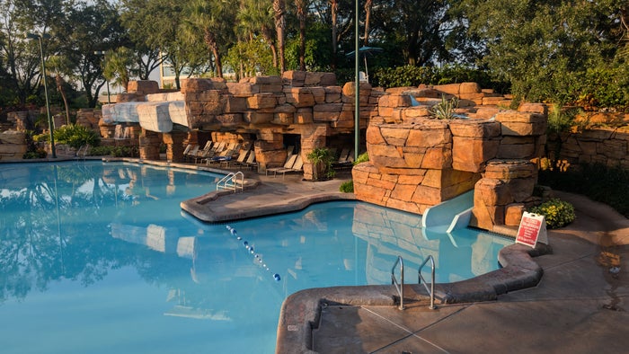 Walt Disney World Dolphin amenities pools grotto pool slide and grotto seating Walt Disney World Dolphin amenities pools grotto pool slide and grotto seating