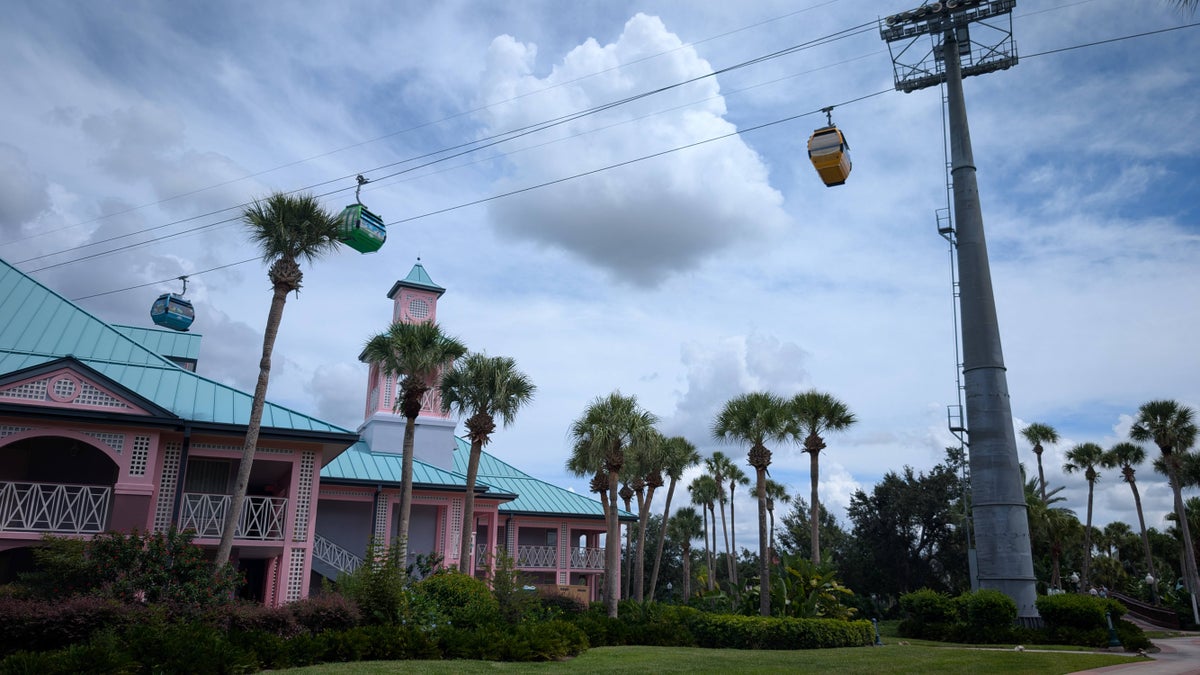 Disney's Caribbean Beach Resort Skyliner over Jamaica buildings