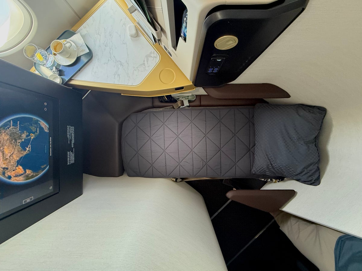 Etihad Airbus A321LR business class seat from fully flat from above Etihad Airbus A321LR business class seat from fully flat from above
