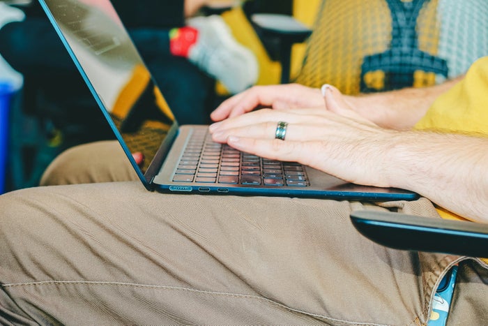 Person typing on a laptop
