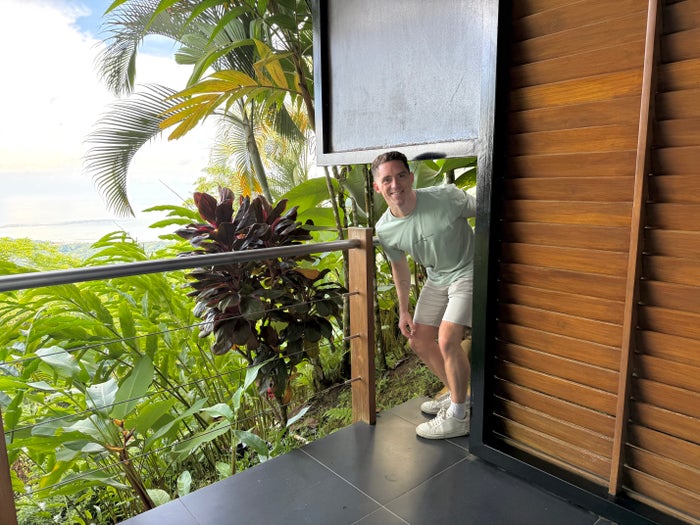 Kura Boutique Costa Rica Daniel entering suite