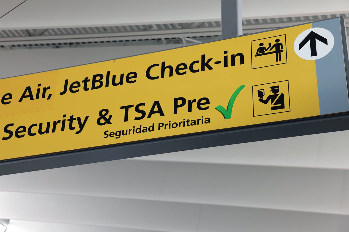 TSA security checkpoint booth JFK 3 TSA PreCheck security JetBlue JFK sign
