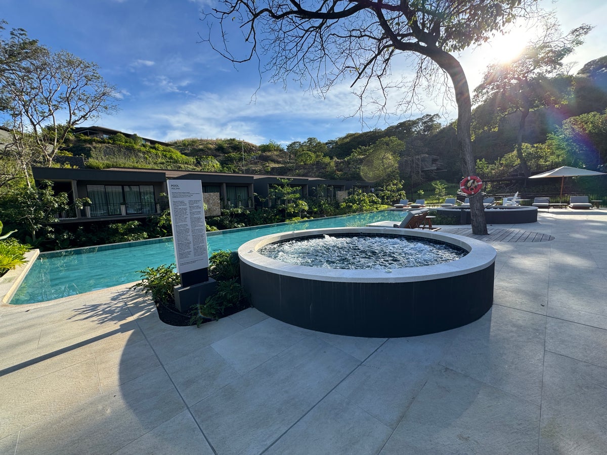 Fitness center in front of quiet adult pool