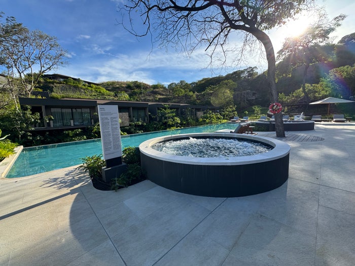 Fitness center in front of quiet adult pool