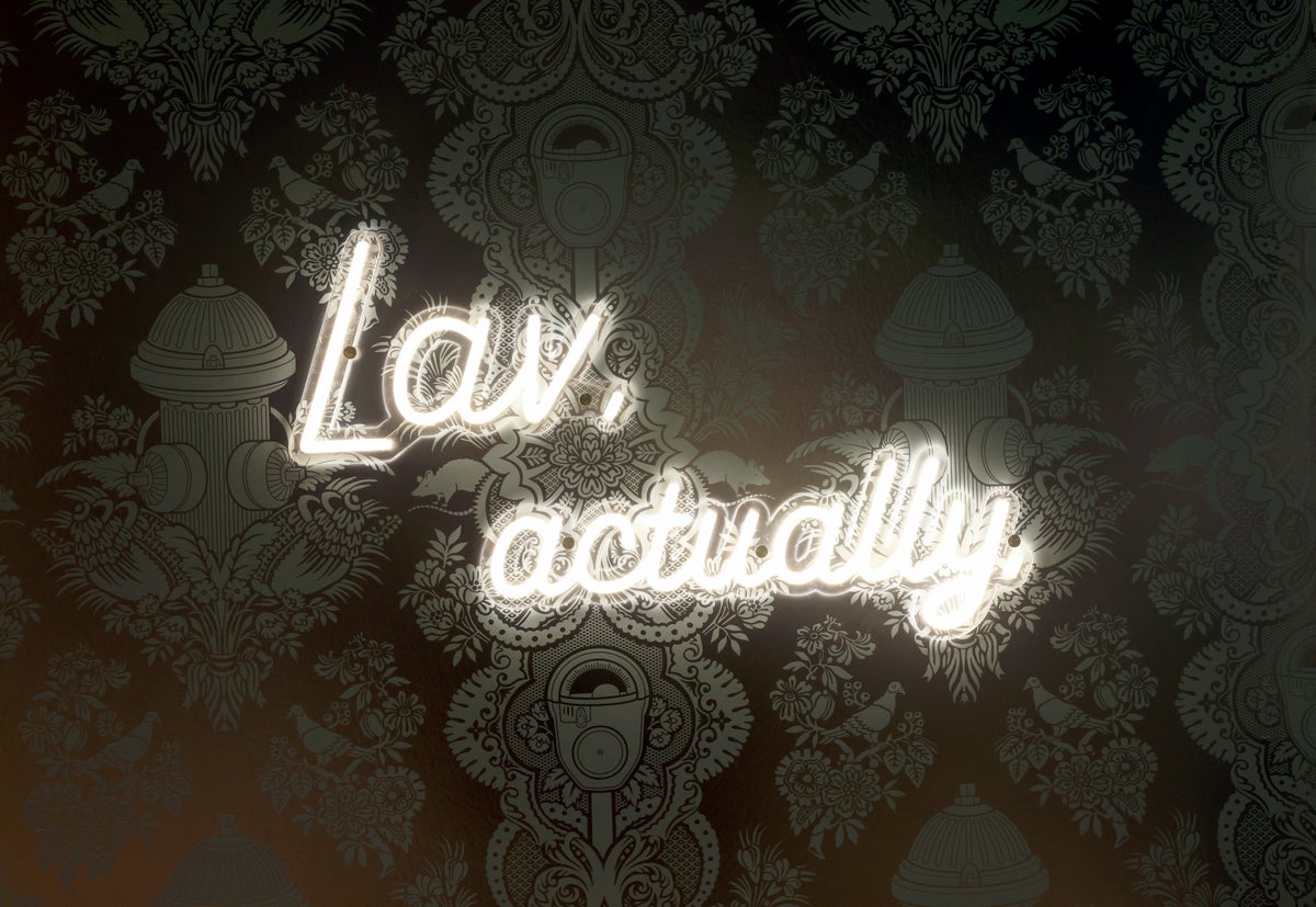 JetBlue JFK BlueHouse lounge bathroom neon sign