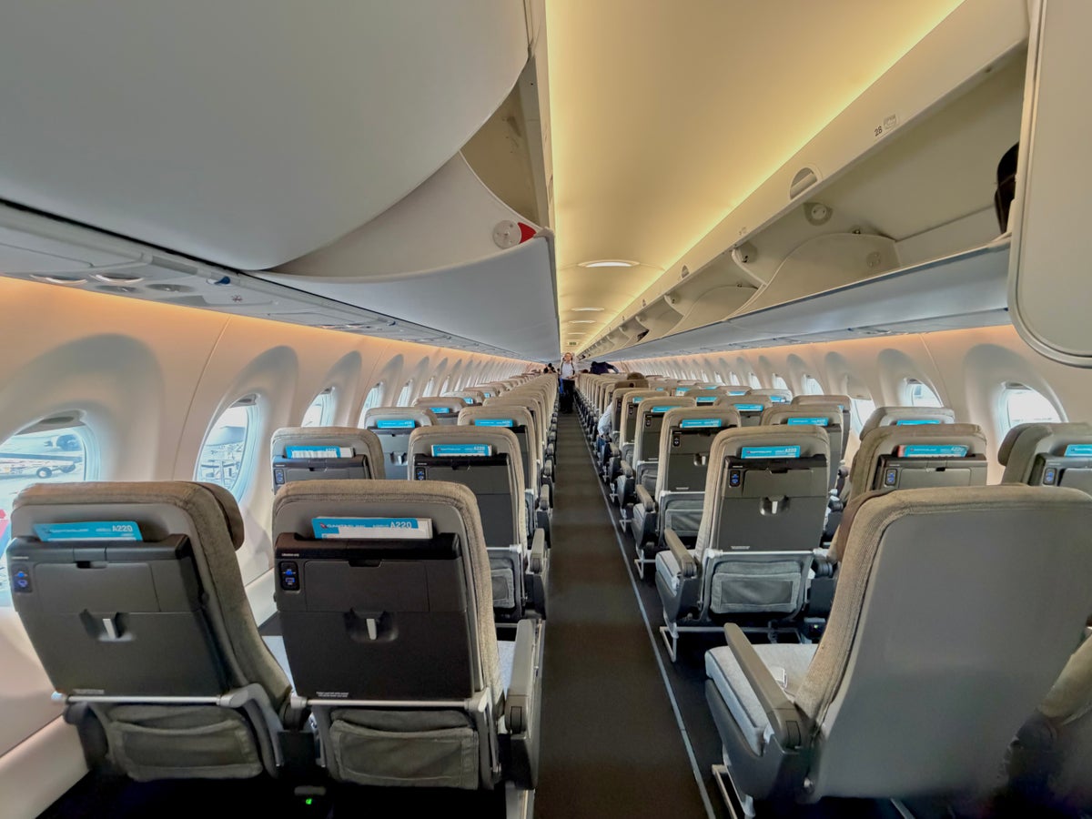 Qantas Airbus A220 economy cabin from the back of the plane