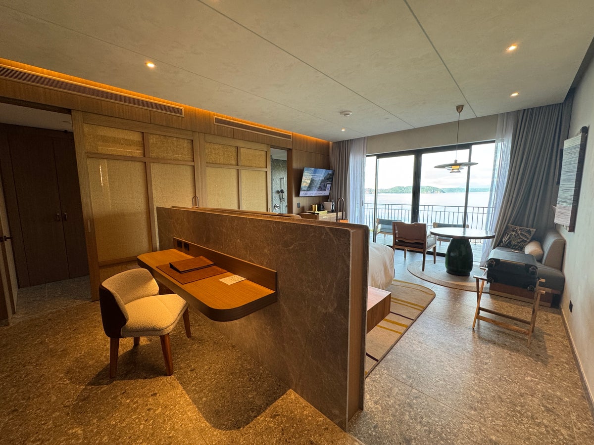 Waldorf Astoria Costa Rica King Suite bedroom desk and bed