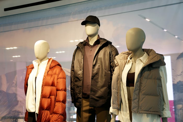 Jar of coins lululemon NYC shopping jacket mannequins
