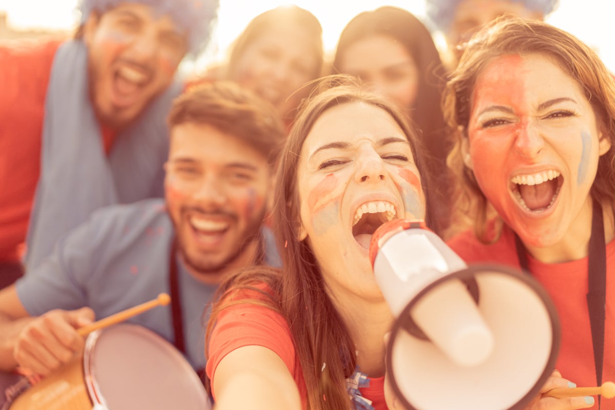 Sports fans cheering