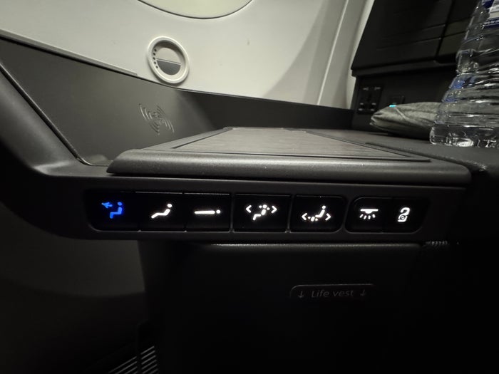 AA Flagship Suite Business Class touchscreen controls seat AA Flagship Suite Business Class touchscreen controls seat
