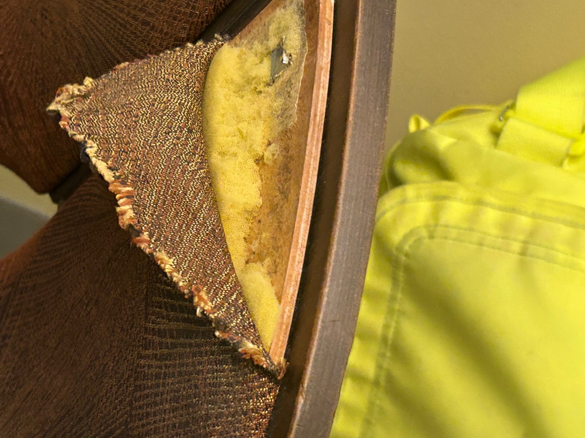 MSP Terminal 1 Escape Lounge coffee pastries station MSP Terminal 1 Escape Lounge ripped seat