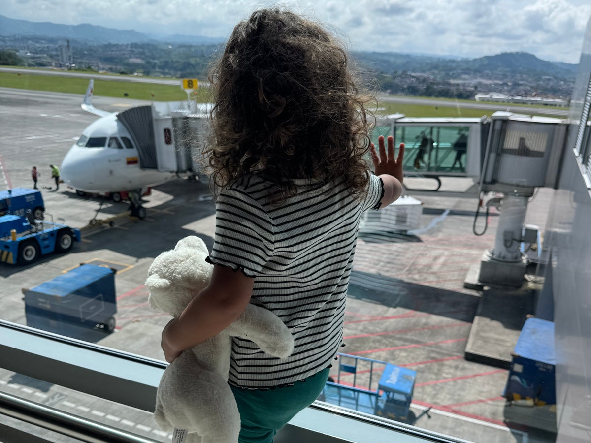 baby looking at plane juan ruiz baby looking at plane juan ruiz