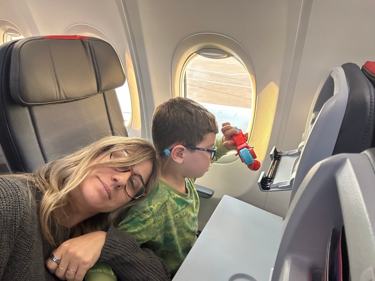 Lori and son on plane Lori and son on plane