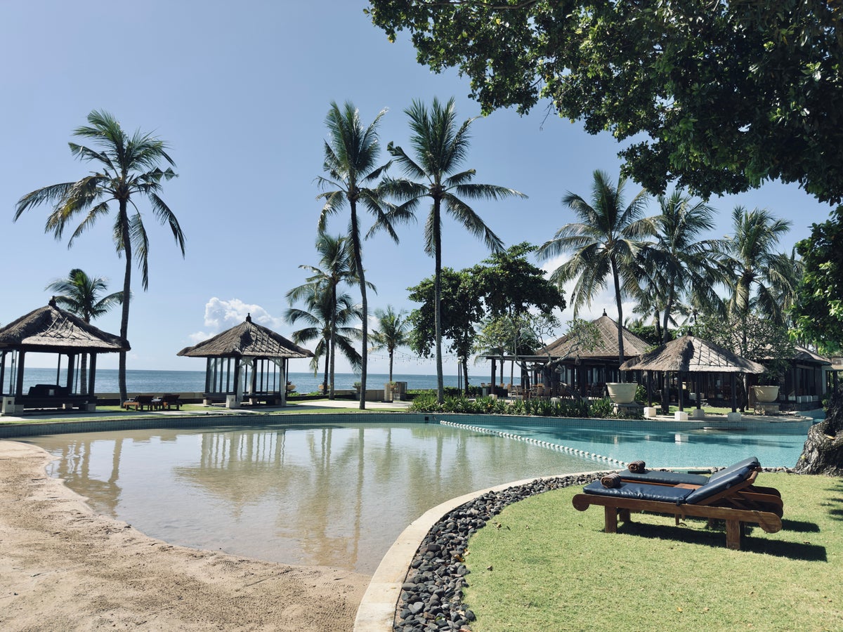 Conrad Bali pool and trees