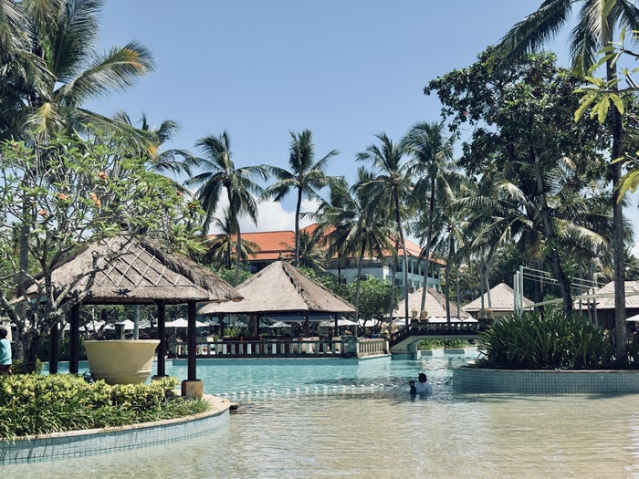 Conrad Bali pool wide view side Conrad Bali pool wide view side