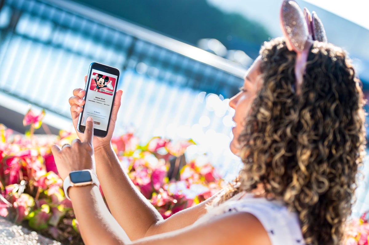 Female using Disney eGift Card