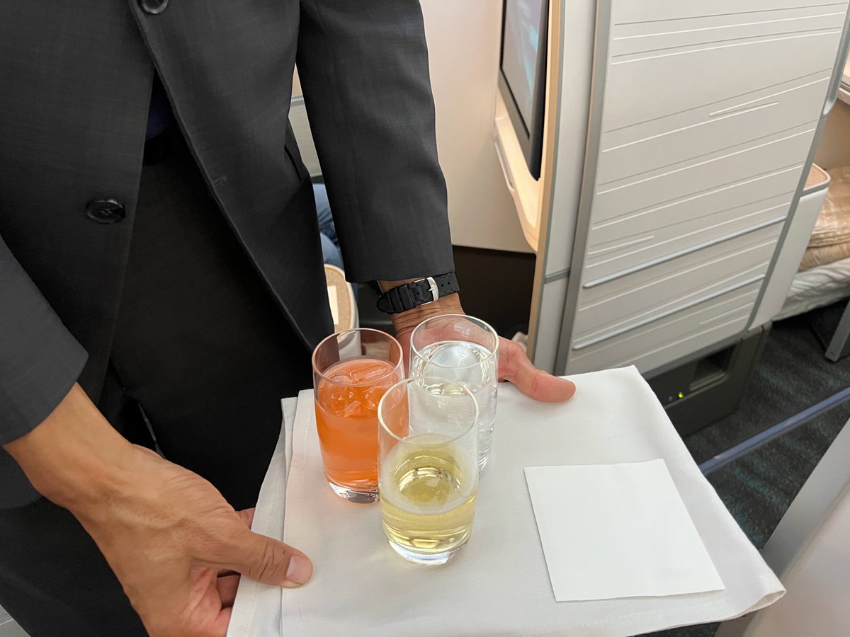 Alaska Airlines business class welcome drink service Alaska Airlines business class welcome drink service