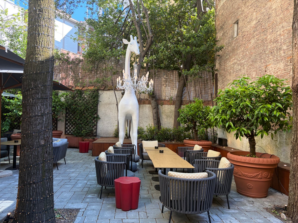 Backyard seating at the Hotel Indigo Florence
