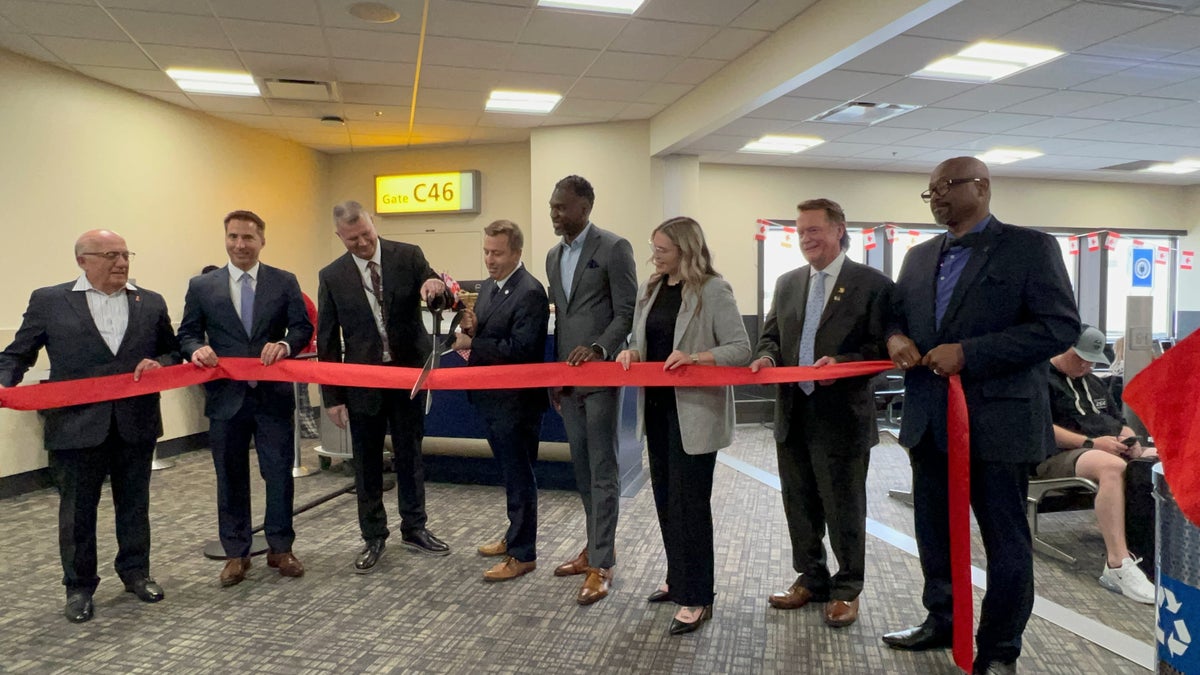 Columbus to Montreal route ribbon cutting