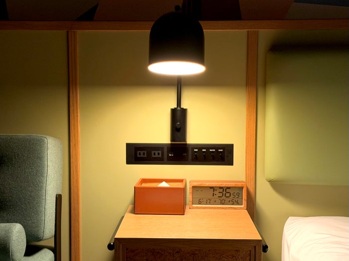 Caption by Hyatt Kabutocho Tokyo bedside table at night