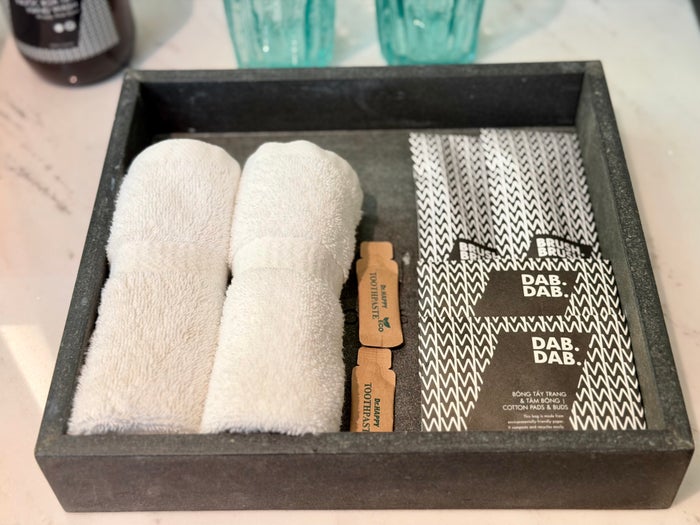 Wink Danang Riverside room bathroom amenities close up