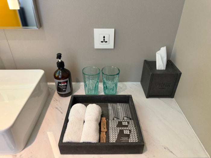 Wink Danang Riverside room bathroom amenities