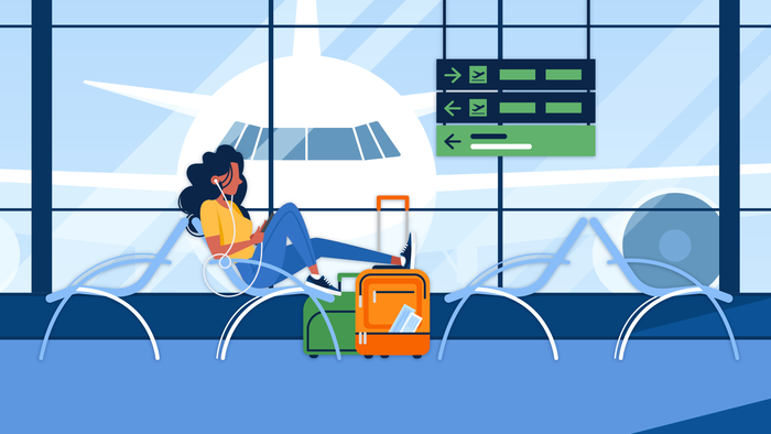 Woman waiting at airport on layover