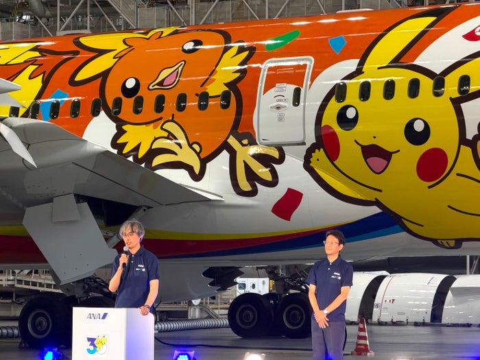 ANA Pokemon Red plane executives