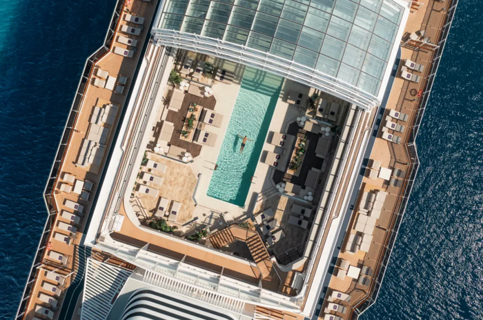 Conservatory pool onboard an Explora Journeys ship