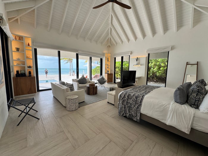 Ambergris Cay beachfront bungalow room