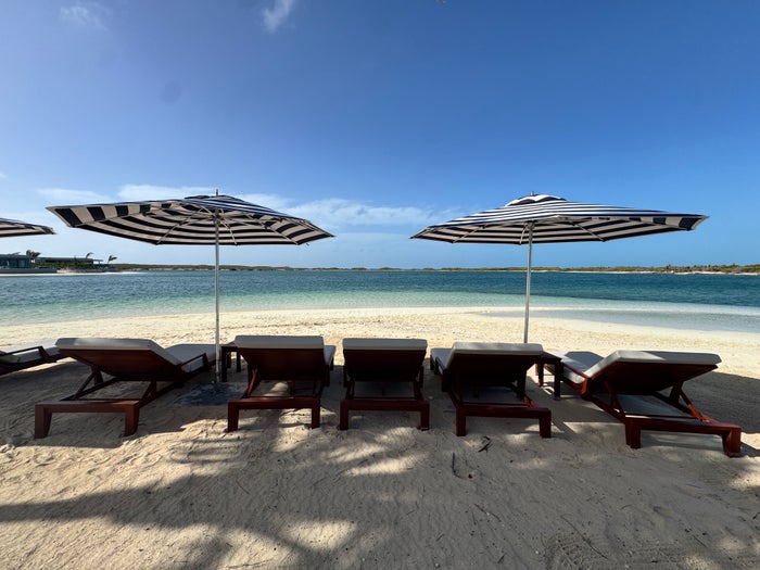 Ambergris Cay lagoon beach chairs
