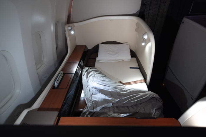 Japan Airlines 777 first bed front